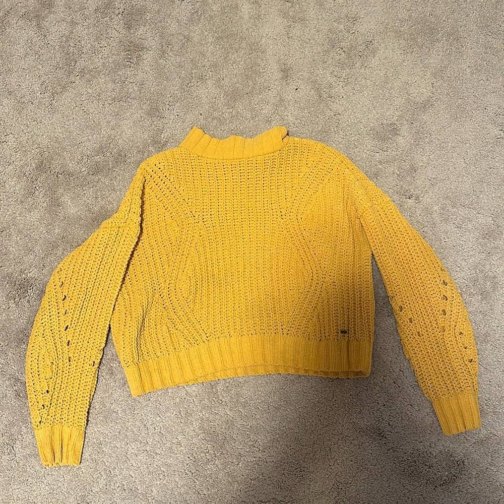 yellow sweater